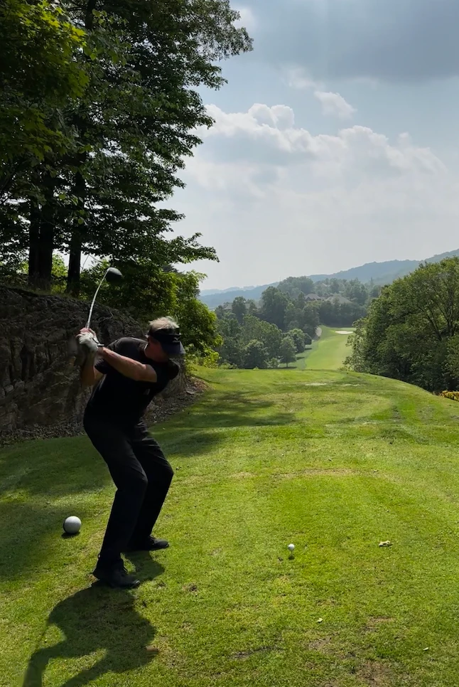 Gary Battersby starting the downswing
