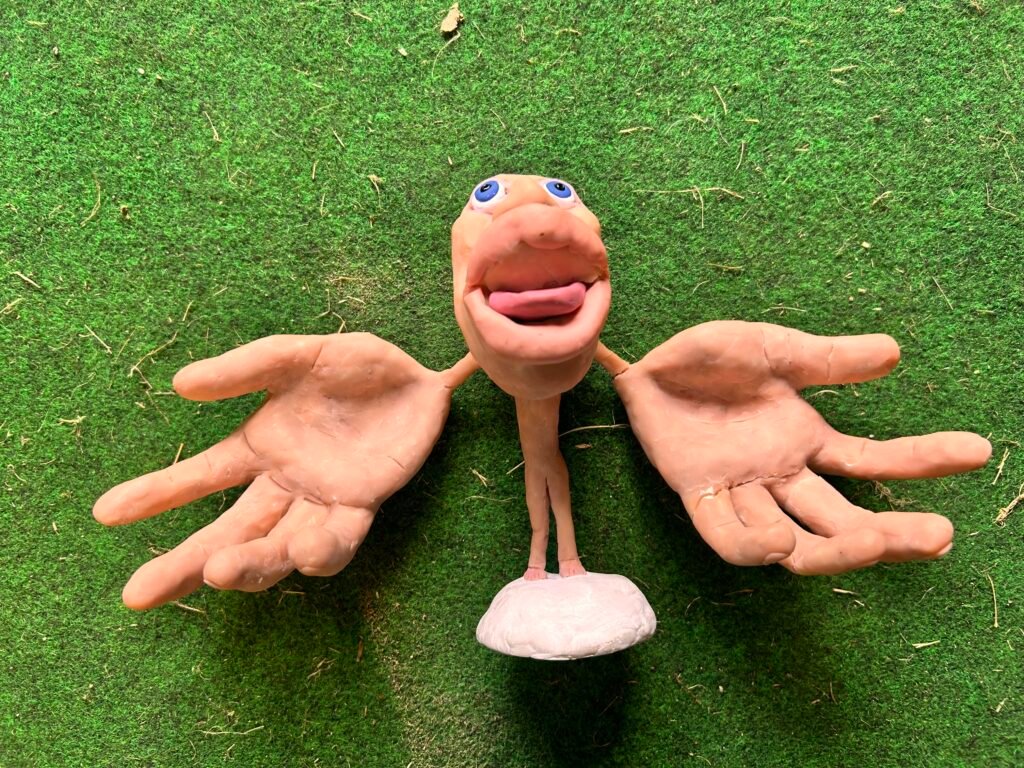touch golf homunculus sculpture